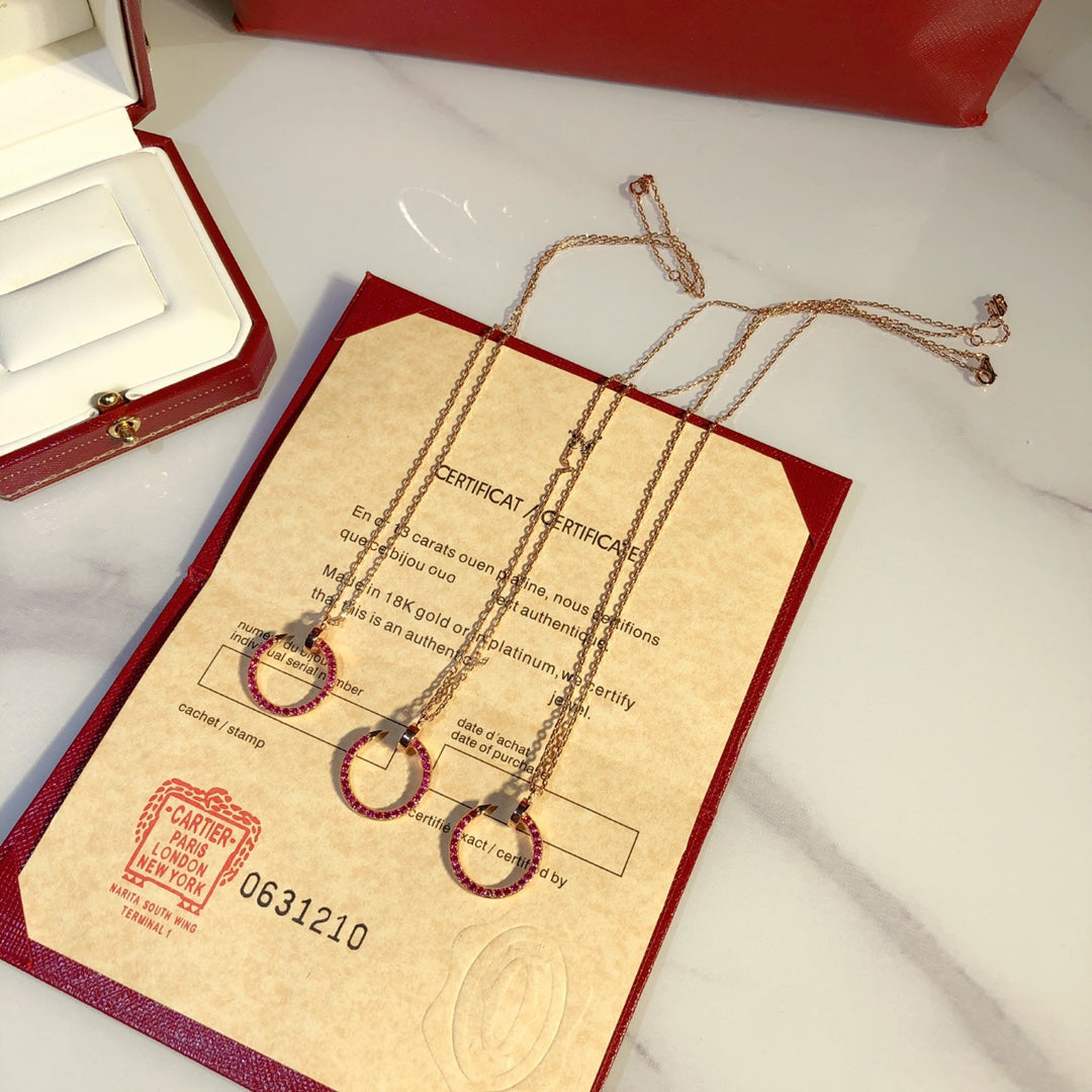 CARTIER JUSTE NECKLACE GOLD RED DIAMONDS