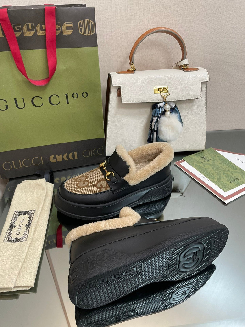 GUCCI LOAFER IN PEANUT BROWN JACQUARD AND BLACK CALFSKIN WITH BEIGE WOOL LINING