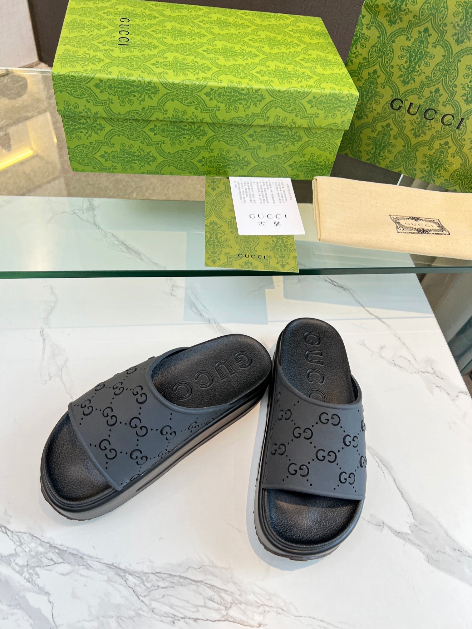 GUCCI PLATFORM SANDALS IN BLACK MONOGRAM IMPORTED TPU
