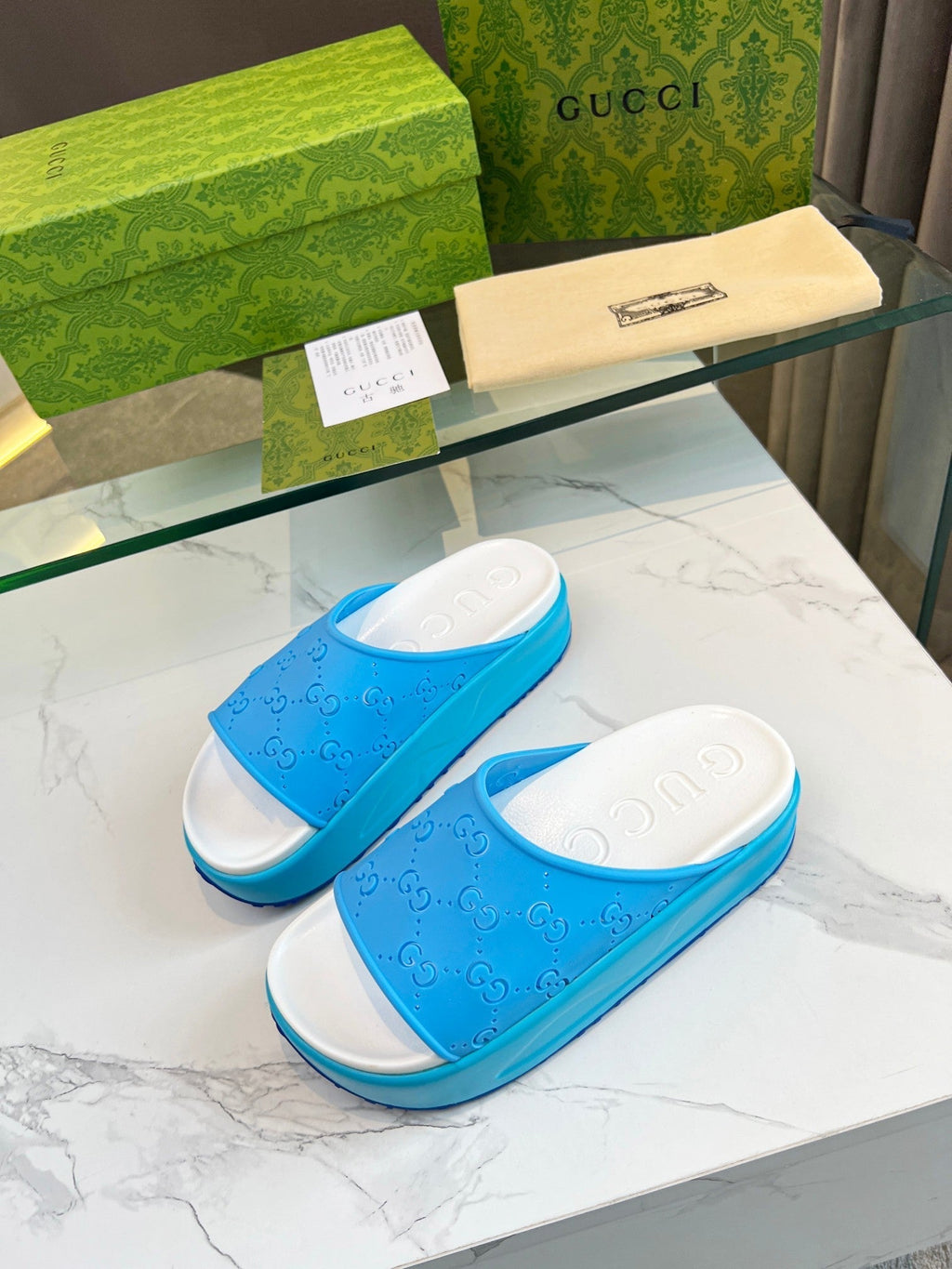 GUCCI PLATFORM SANDALS IN SKY BLUE MONOGRAM IMPORTED TPU