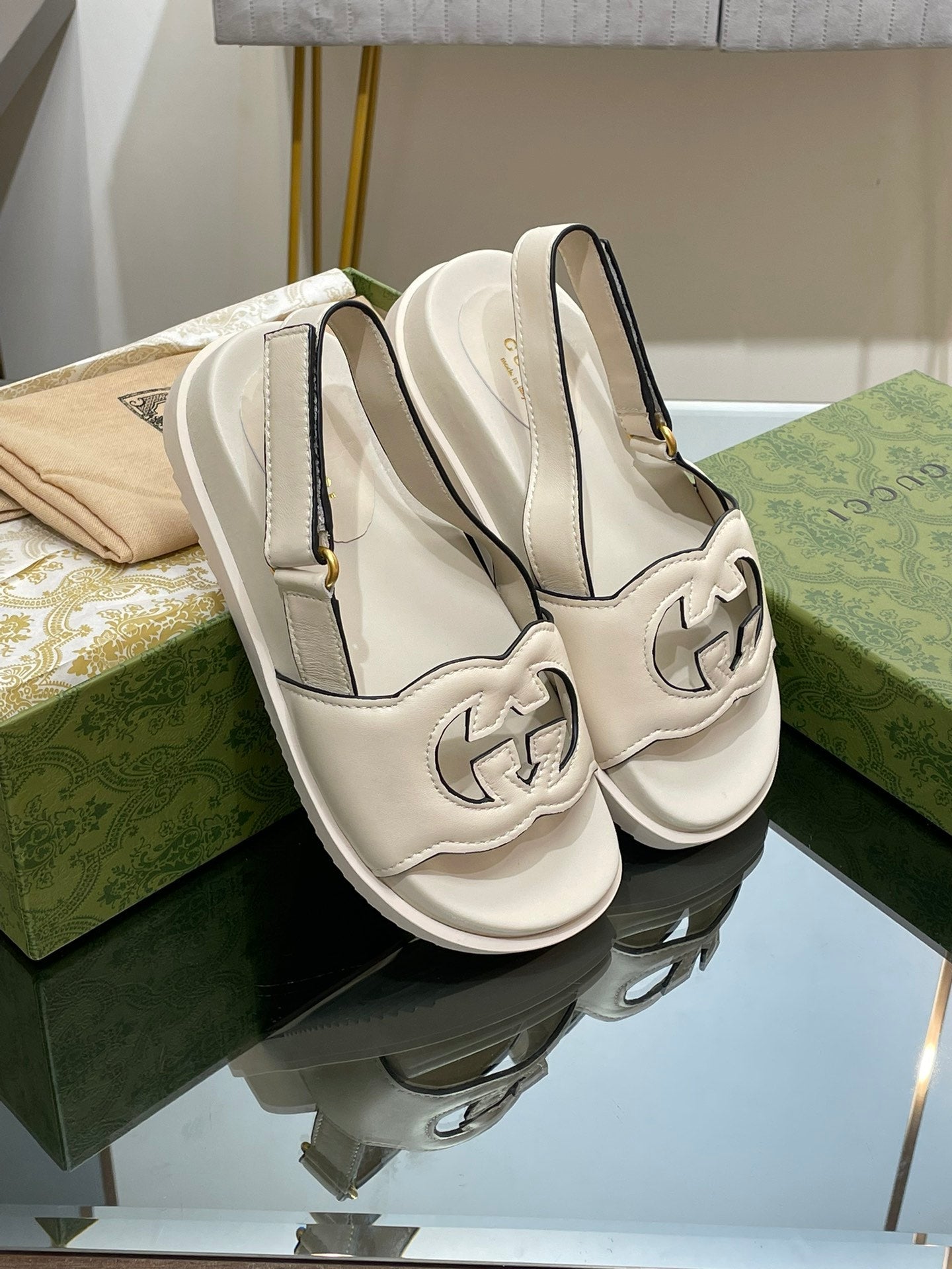 GUCCI INTERLOCKING G CUT OUT SANDAL WHITE LAMBSKIN