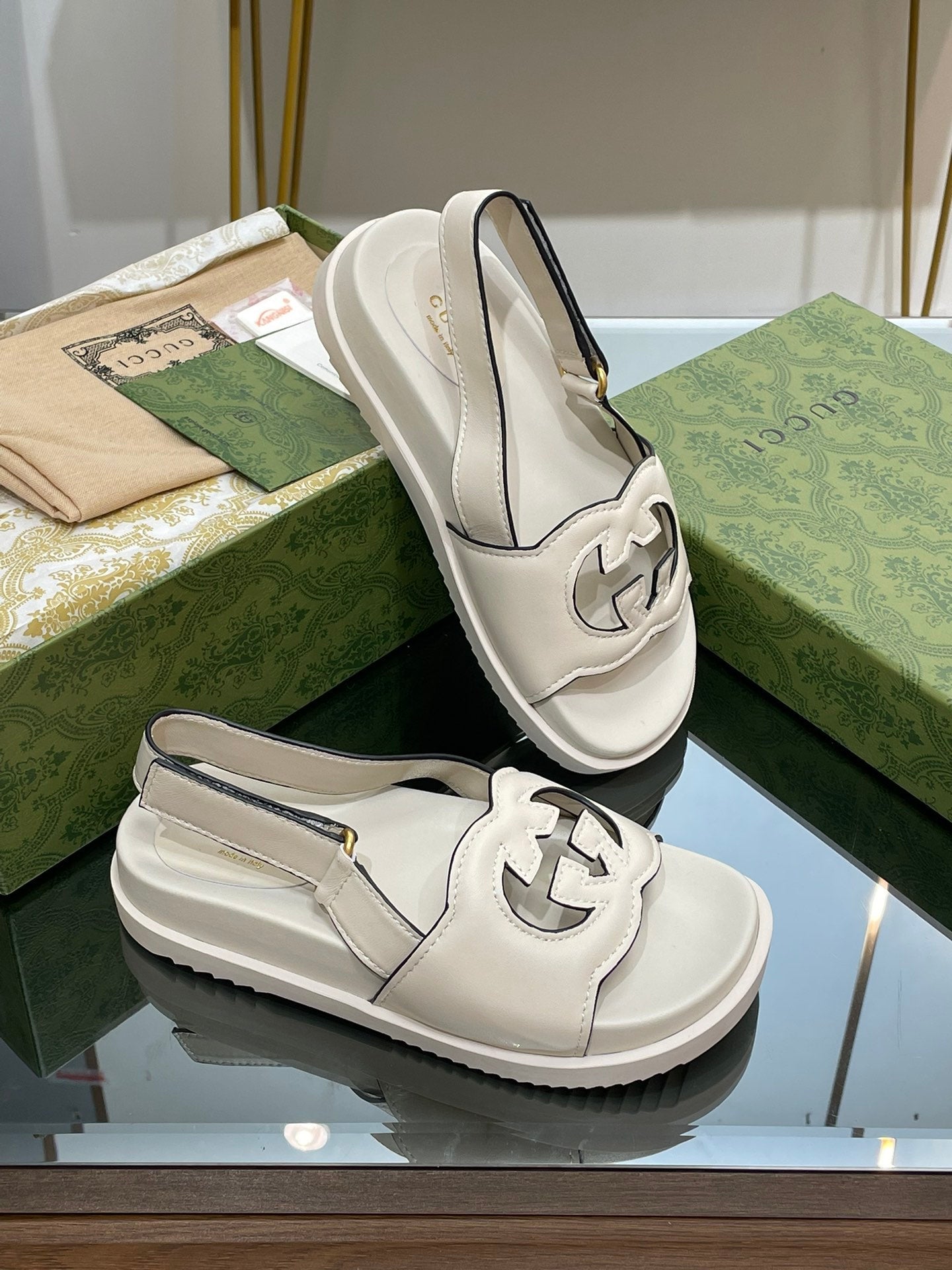 GUCCI INTERLOCKING G CUT OUT SANDAL WHITE LAMBSKIN