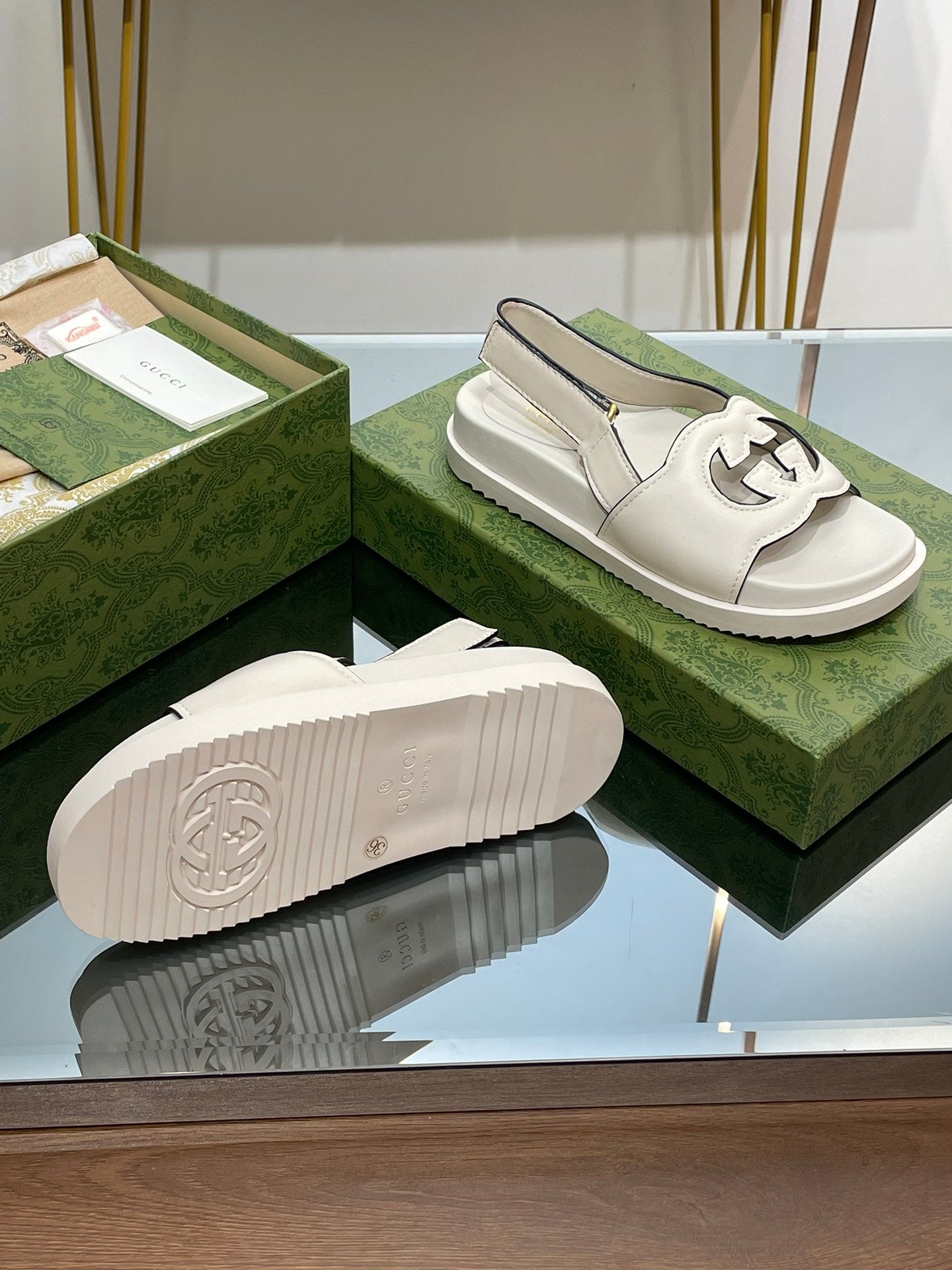 GUCCI INTERLOCKING G CUT OUT SANDAL WHITE LAMBSKIN