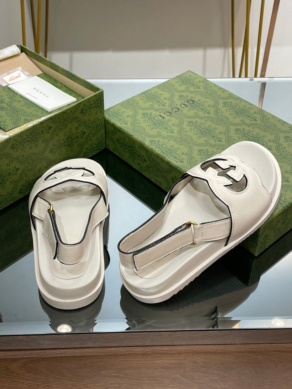 GUCCI INTERLOCKING G CUT OUT SANDAL WHITE LAMBSKIN