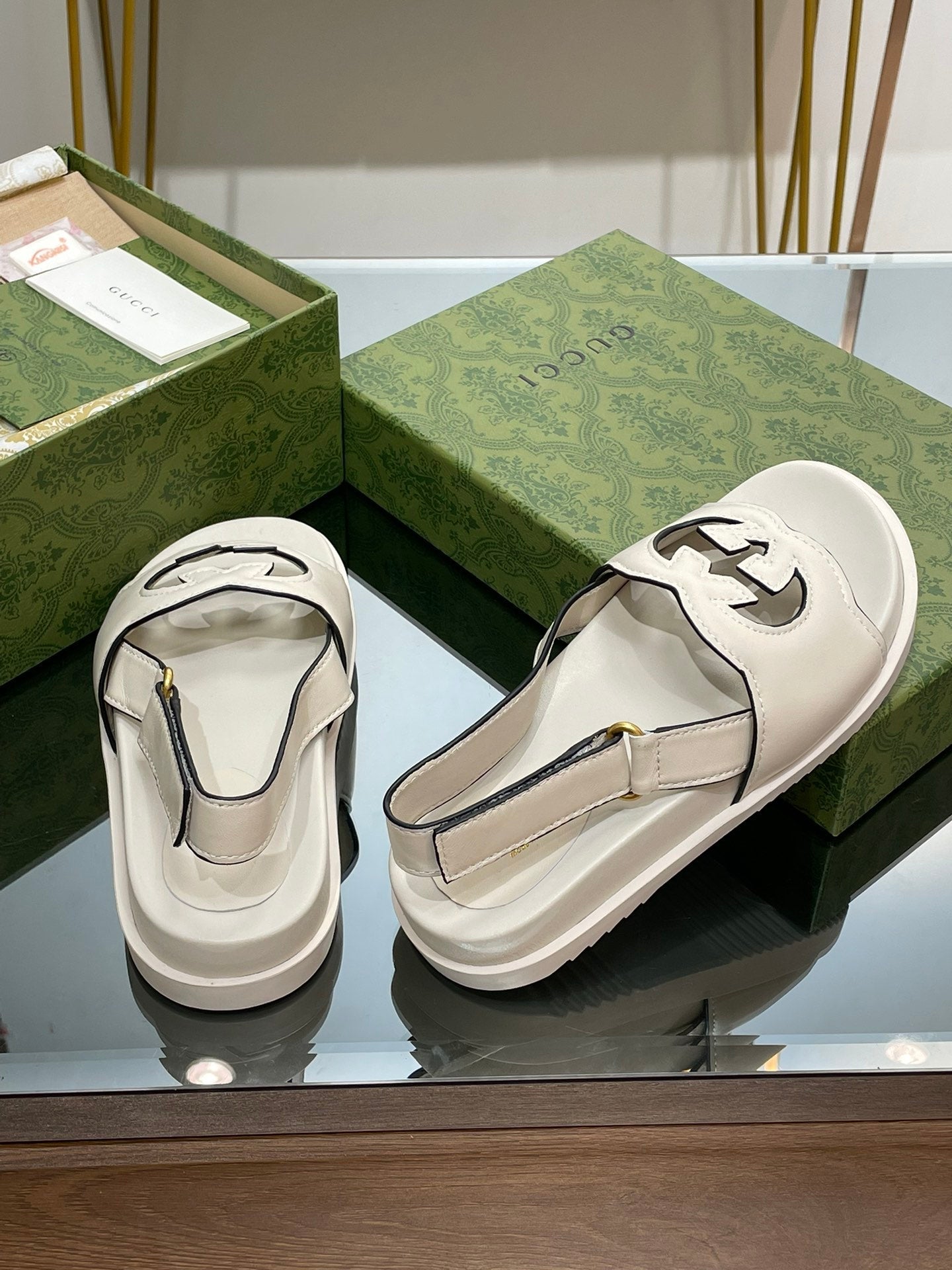 GUCCI INTERLOCKING G CUT OUT SANDAL WHITE LAMBSKIN
