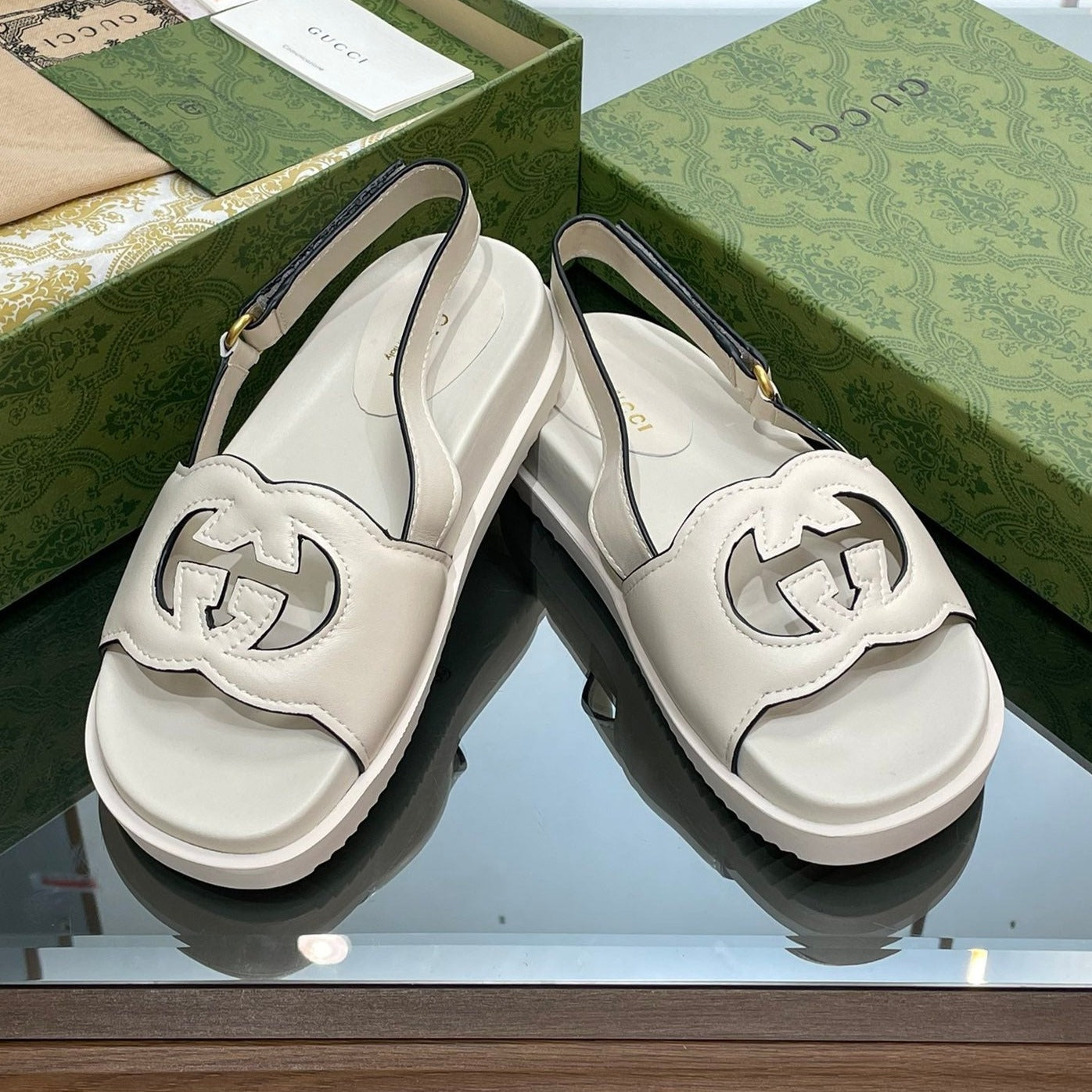 GUCCI INTERLOCKING G CUT OUT SANDAL WHITE LAMBSKIN