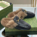 GUCCI HORSEBIT MULE IN BLACK EMBOSSED CALFSKIN AND LAMB WOOL LINING