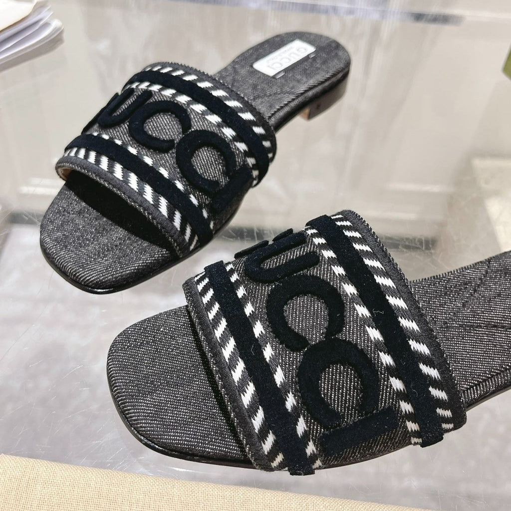 GUCCI Interlocking double G hollow slippers Black
