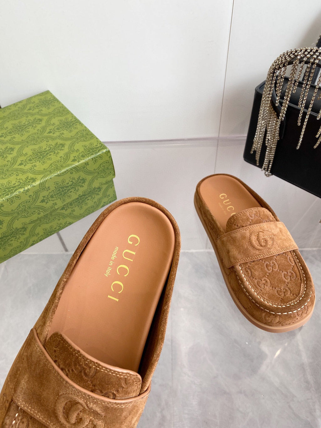 GUCCI LOAFERS IN BROWN MONOGRAM EMBOSSED SUEDE