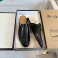 GUCCI SLIPPER MULES BLACK