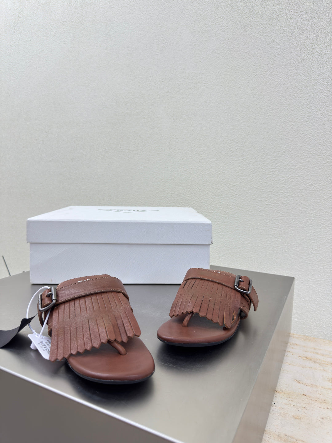 PRADA 25S SHUFFLE LEATHER THONG SANLS IN SIENNA CALFSKIN