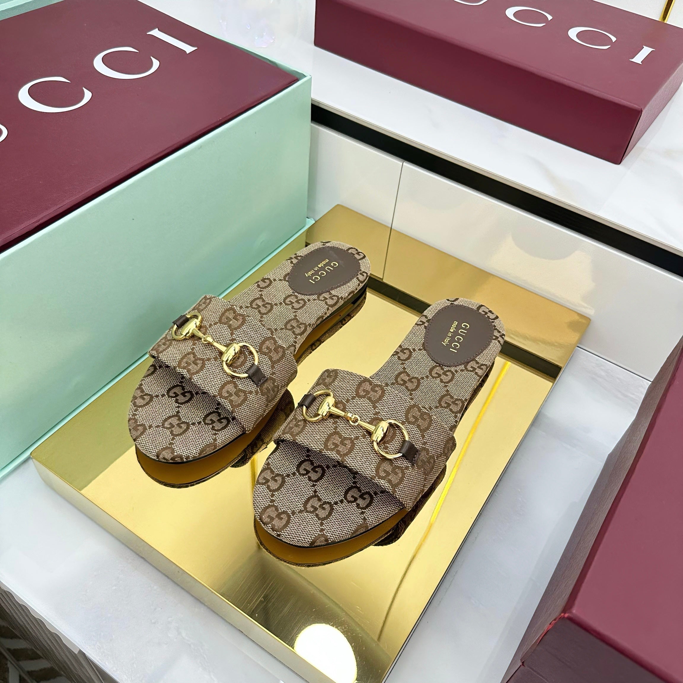 GUCCI SLIDES IN DARK BEIGE WITH GOLD HARDWARE
