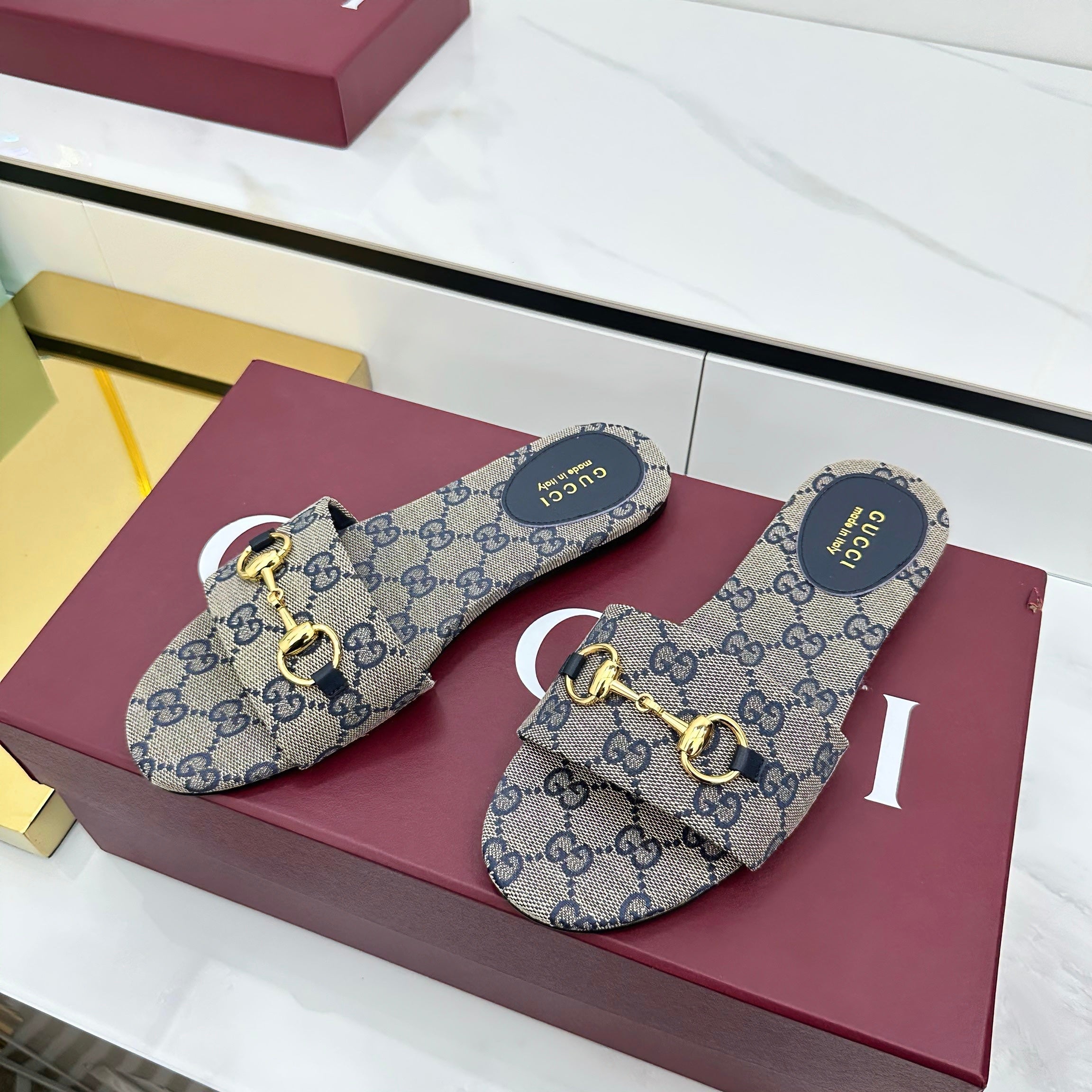 GUCCI SLIDES IN STONE GREY WITH GOLD HARDWARE