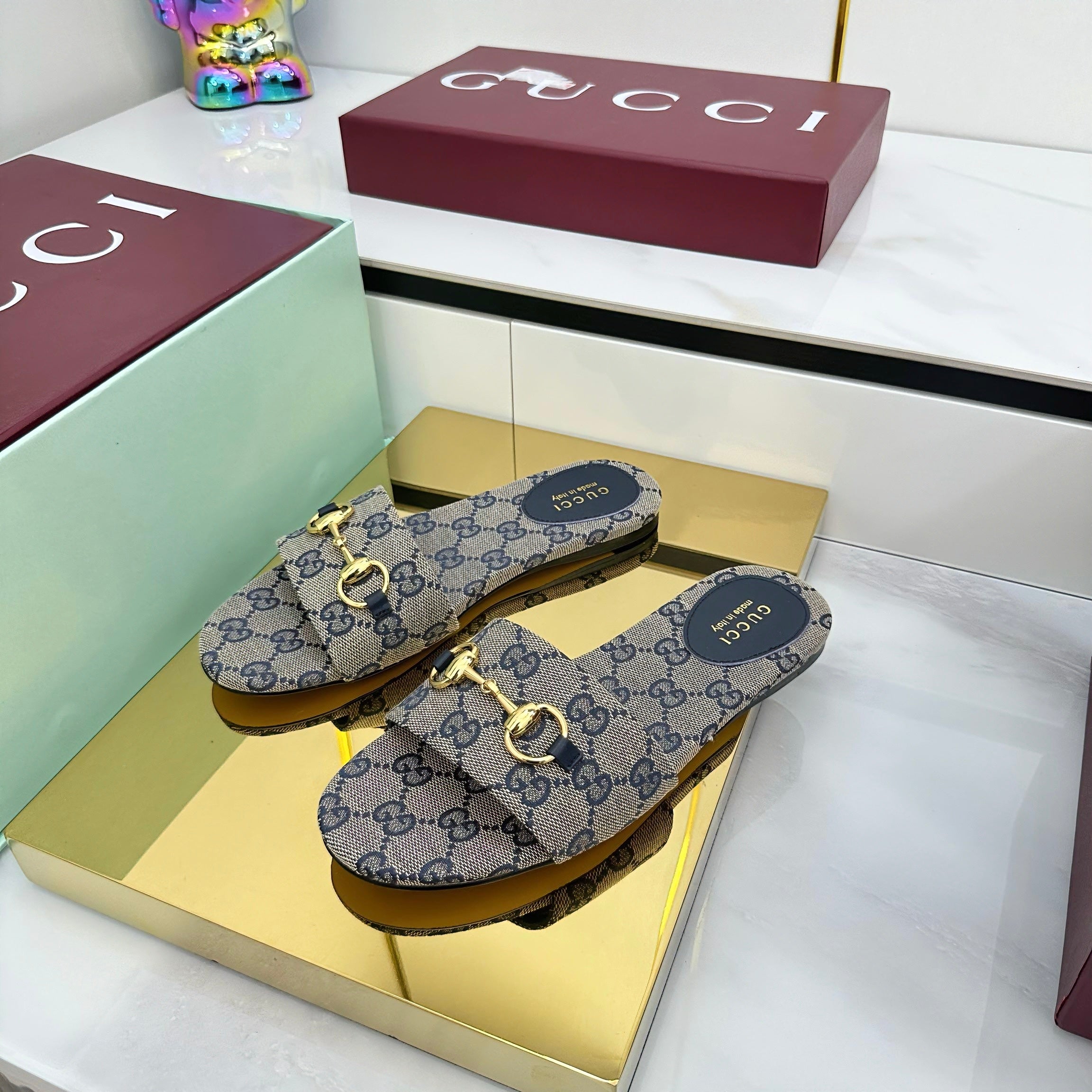 GUCCI SLIDES IN STONE GREY WITH GOLD HARDWARE
