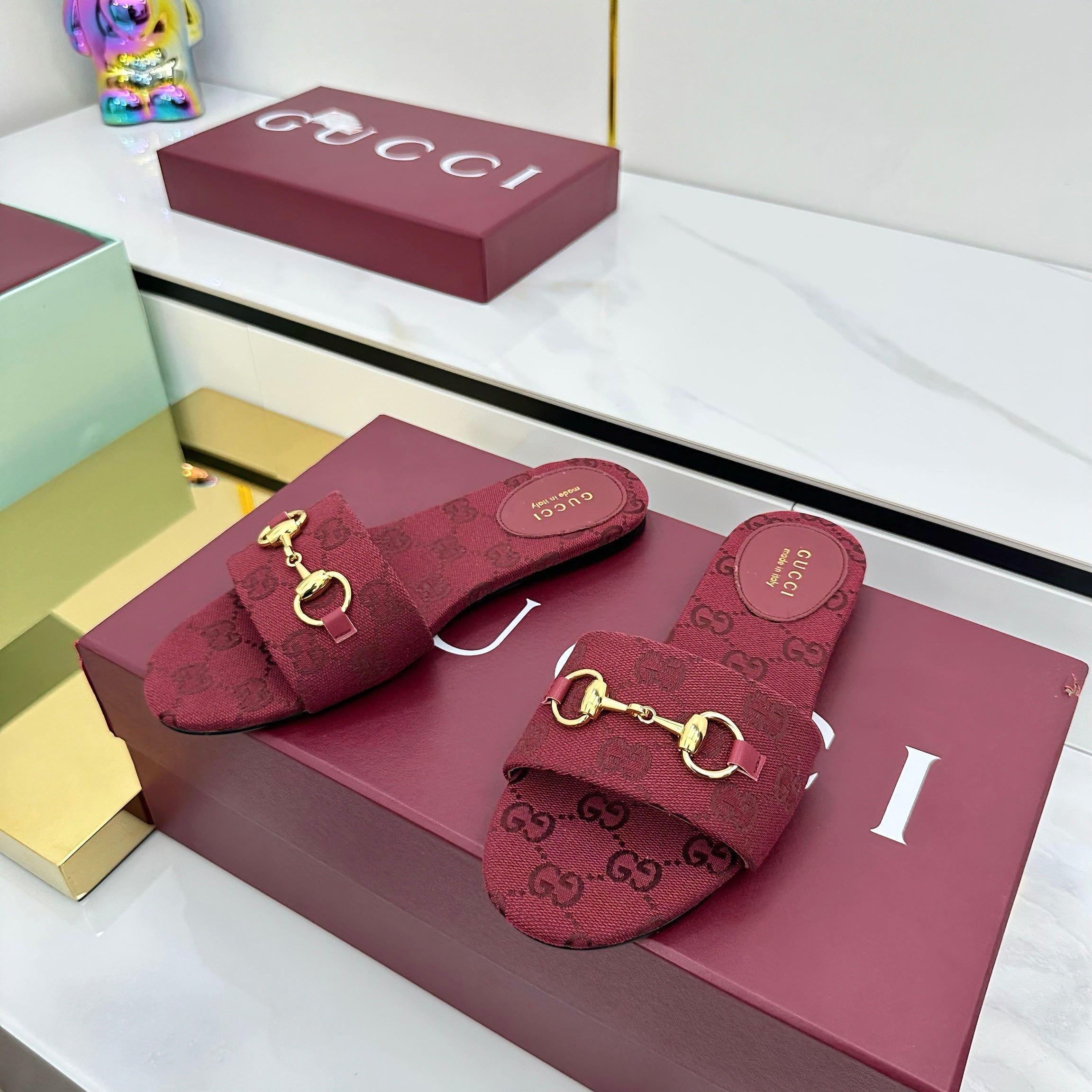 GUCCI SLIDES IN RED WITH GOLD HARDWARE