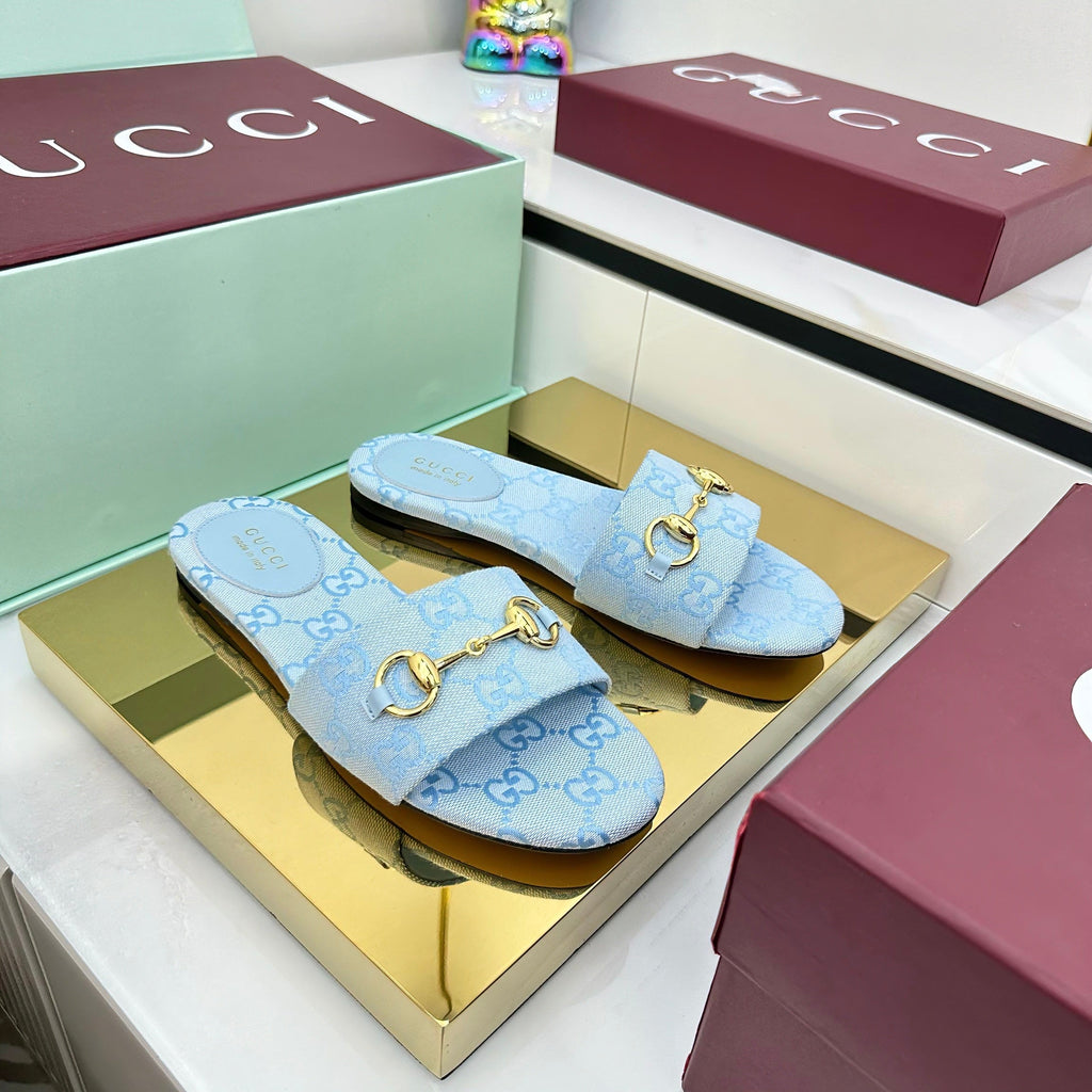 GUCCI SLIDES IN BLUE WITH GOLD HARDWARE