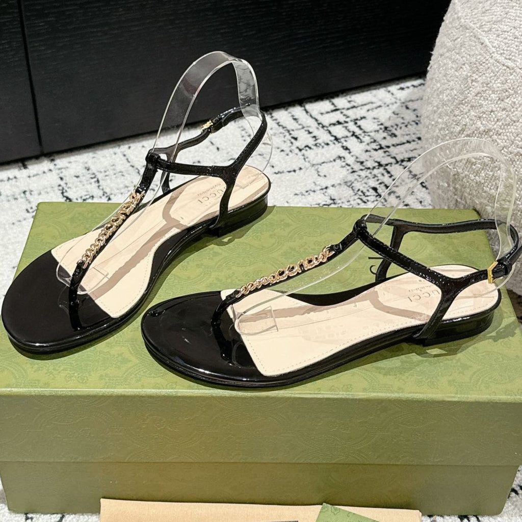 GUCCI THONG SANDAL IN BLACK CALFSKIN WITH GOLD HARDWARE
