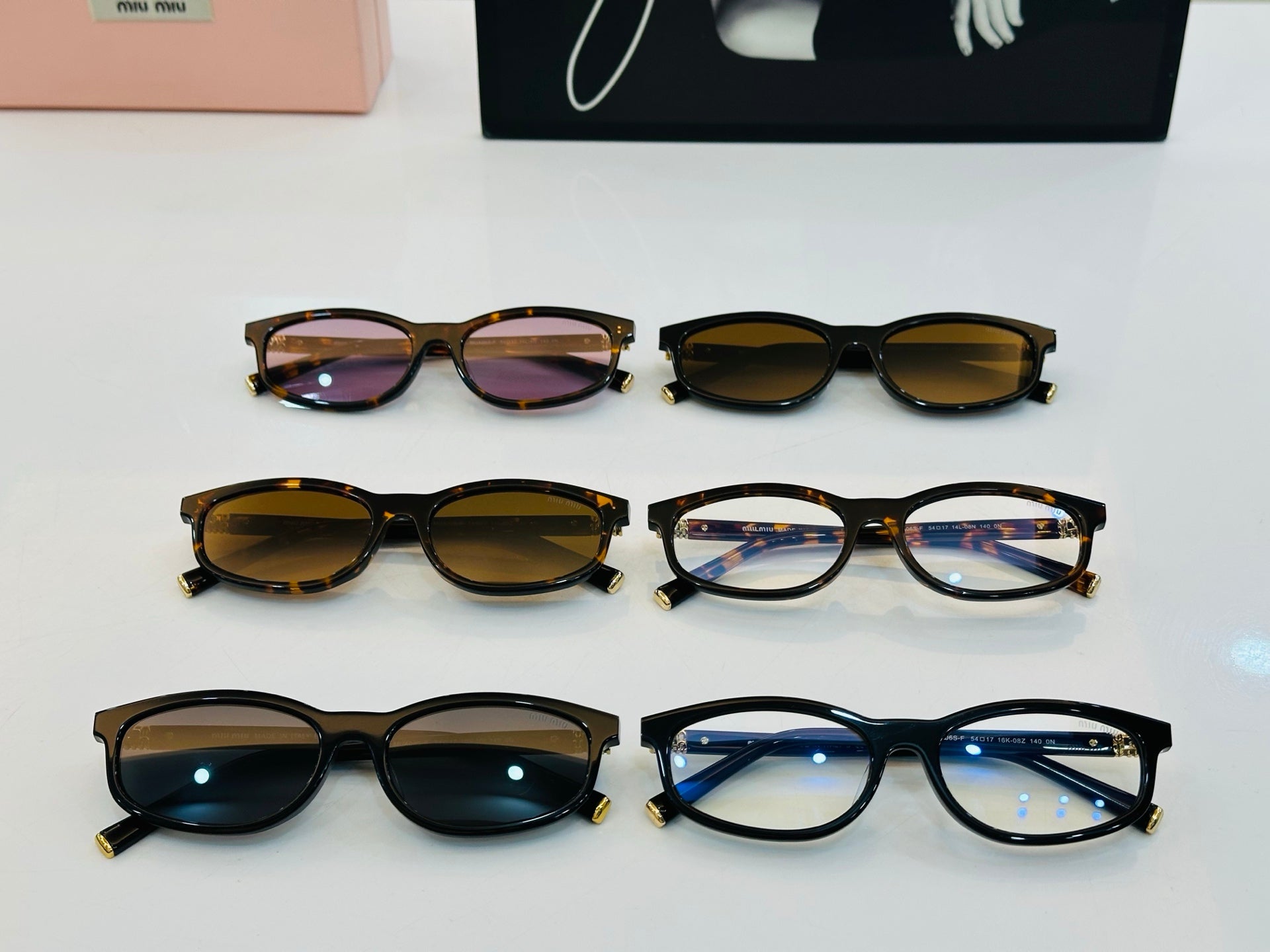 MIU SUNGLASSES IN RECTANGULAR ACETATE 646116