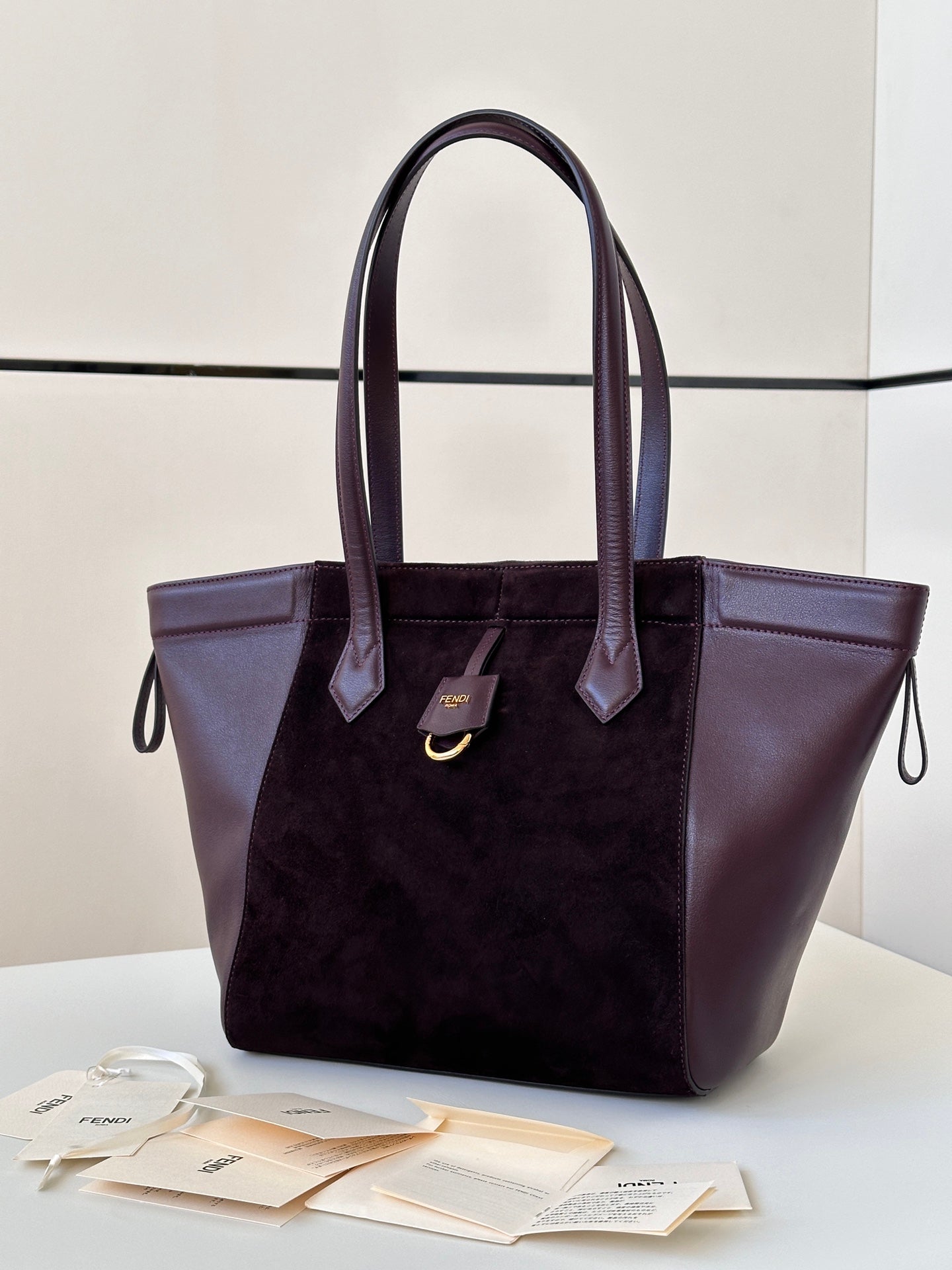 ORIGAMI MEDIUM 27 IN WINE RED LAMBSKIN AND SUEDE