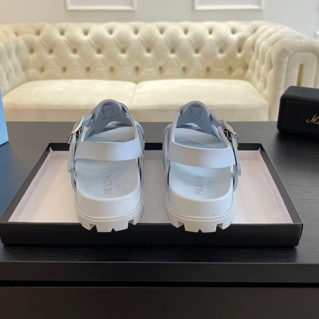 PRADA CRISSCROSS RUBBER SANLS PASTEL SKY CALFSKIN