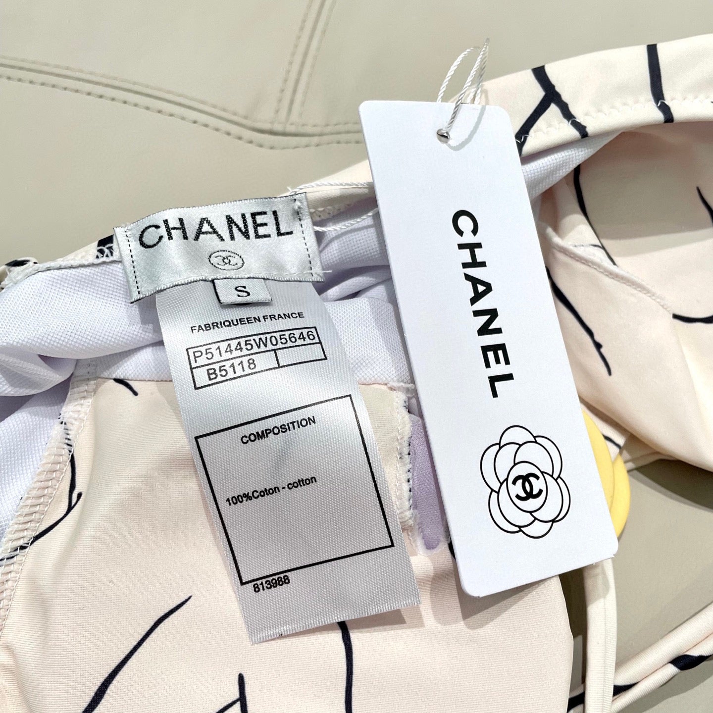 CHANEL BIKINI SWIMSUIT SET IN CREAMY WHITE MIXED WITH CURVED BLACK DETAIL 608919