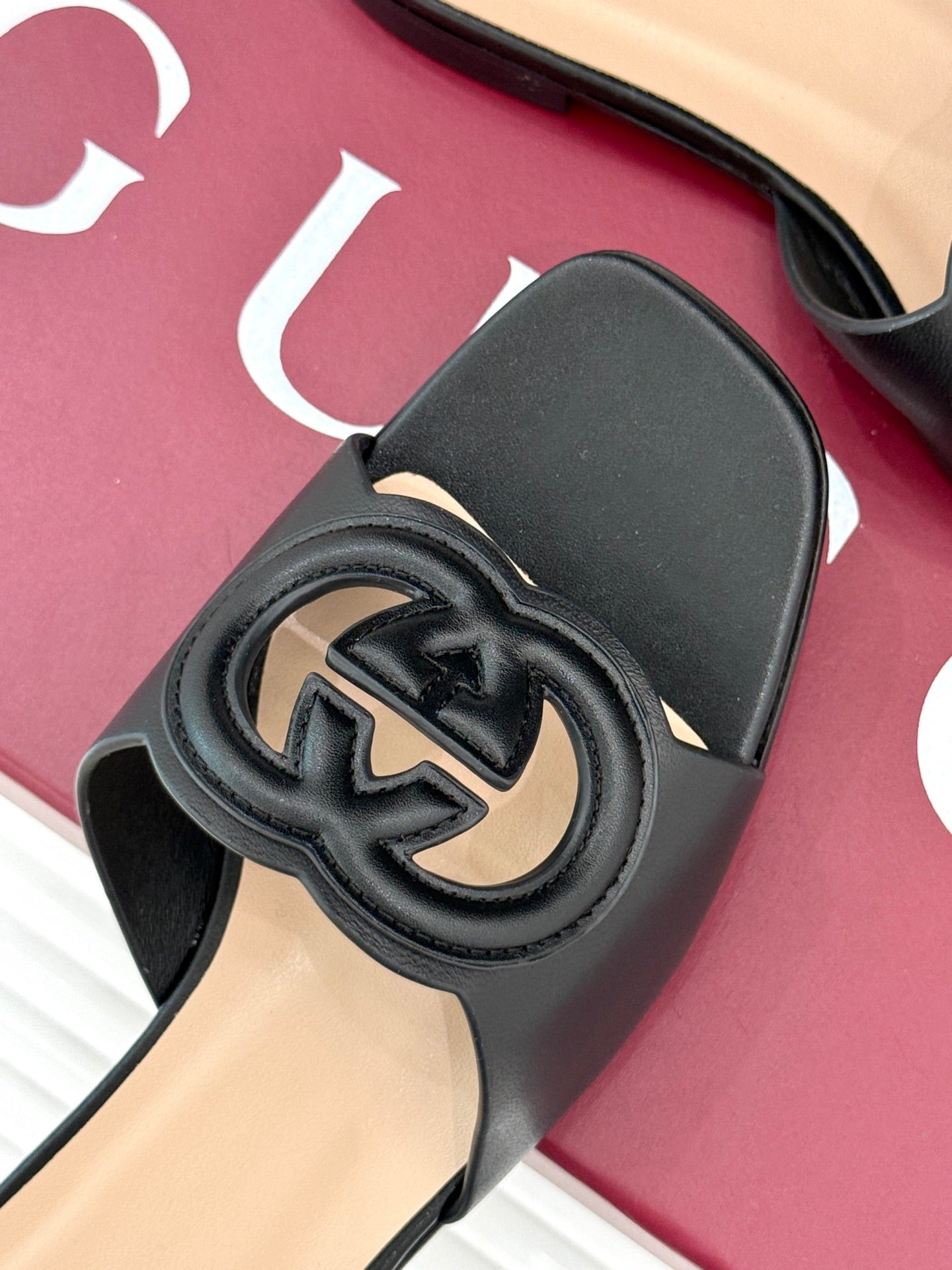 GUCCI SLIDE SANDALS IN BURNT BLACK CALFSKIN