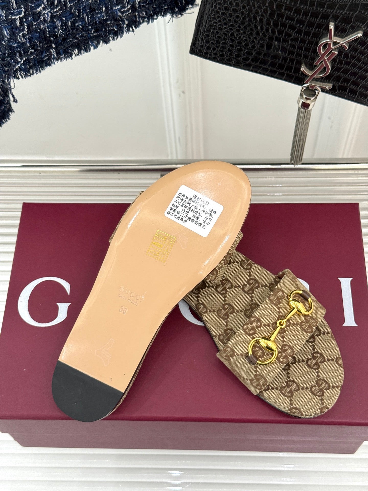 GUCCI SLIDE SANDALS IN DARK BEIGE FABRIC EMBOSSED LOGO