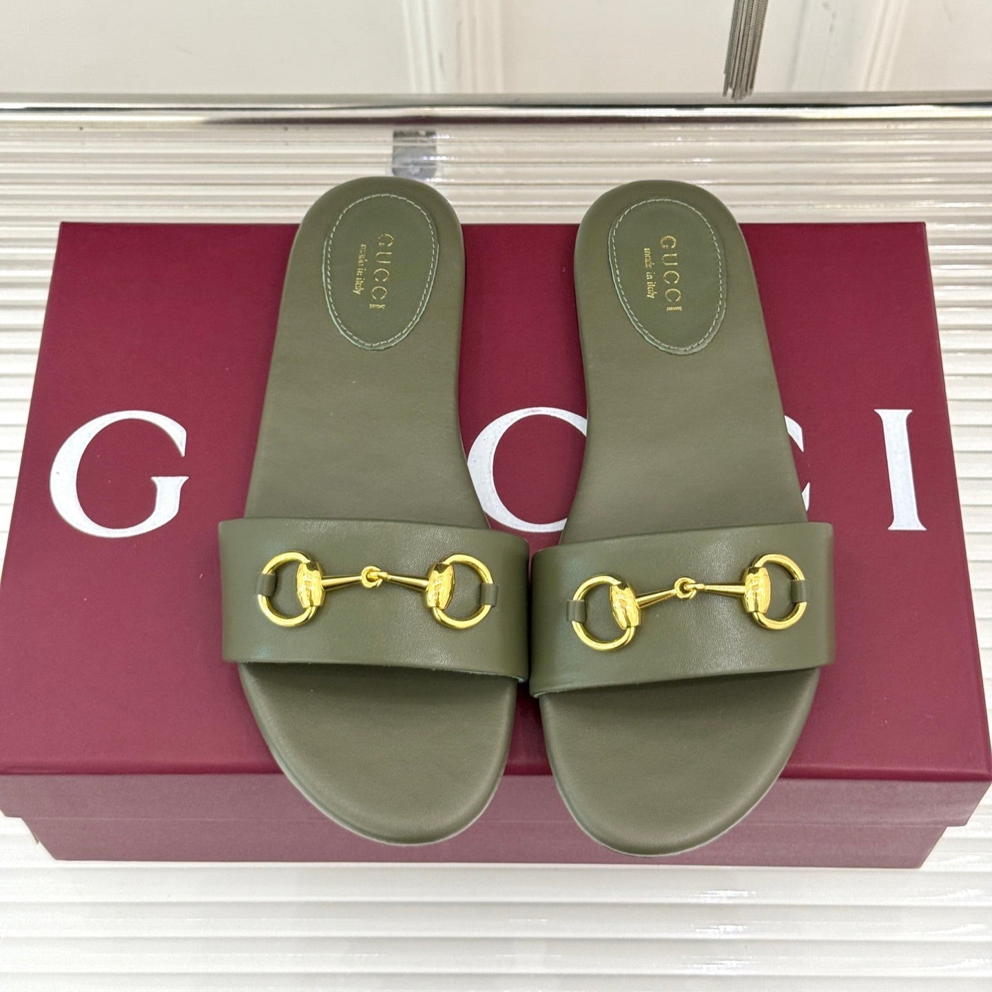 GUCCI SLIDE SANDALS IN MOSS GREEN CALFSKIN WITH GOLD HARDWARE