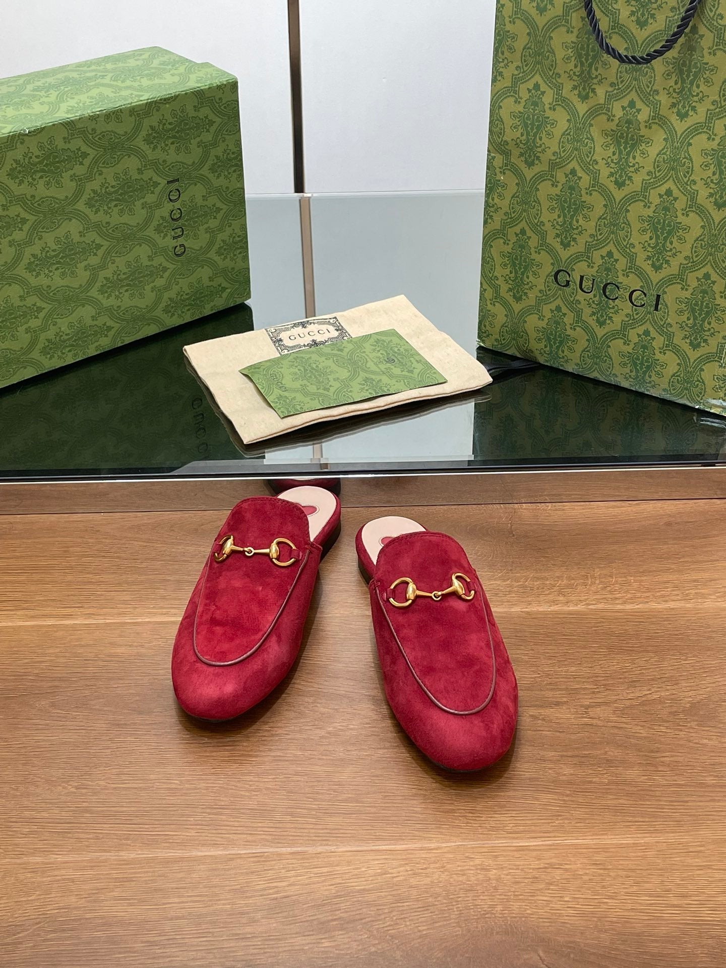 GUCCI HORSEBIT MULE IN CHERRY RED SUEDE WITH GOLD HARDWARE