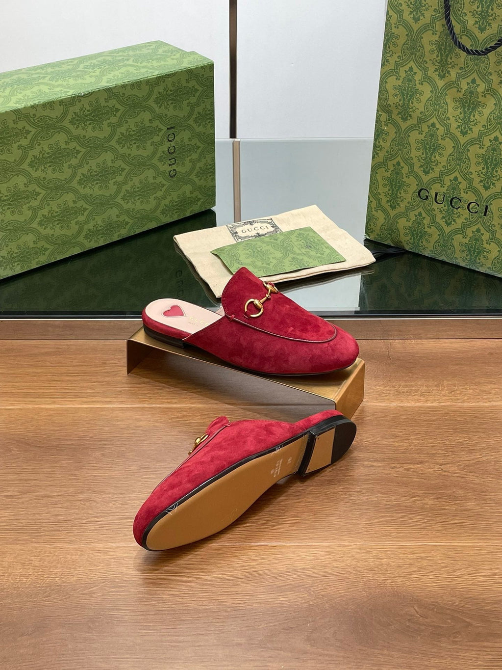 GUCCI HORSEBIT MULE IN CHERRY RED SUEDE WITH GOLD HARDWARE