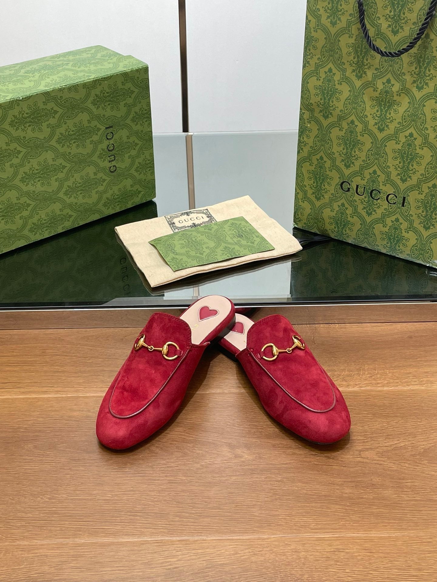 GUCCI HORSEBIT MULE IN CHERRY RED SUEDE WITH GOLD HARDWARE