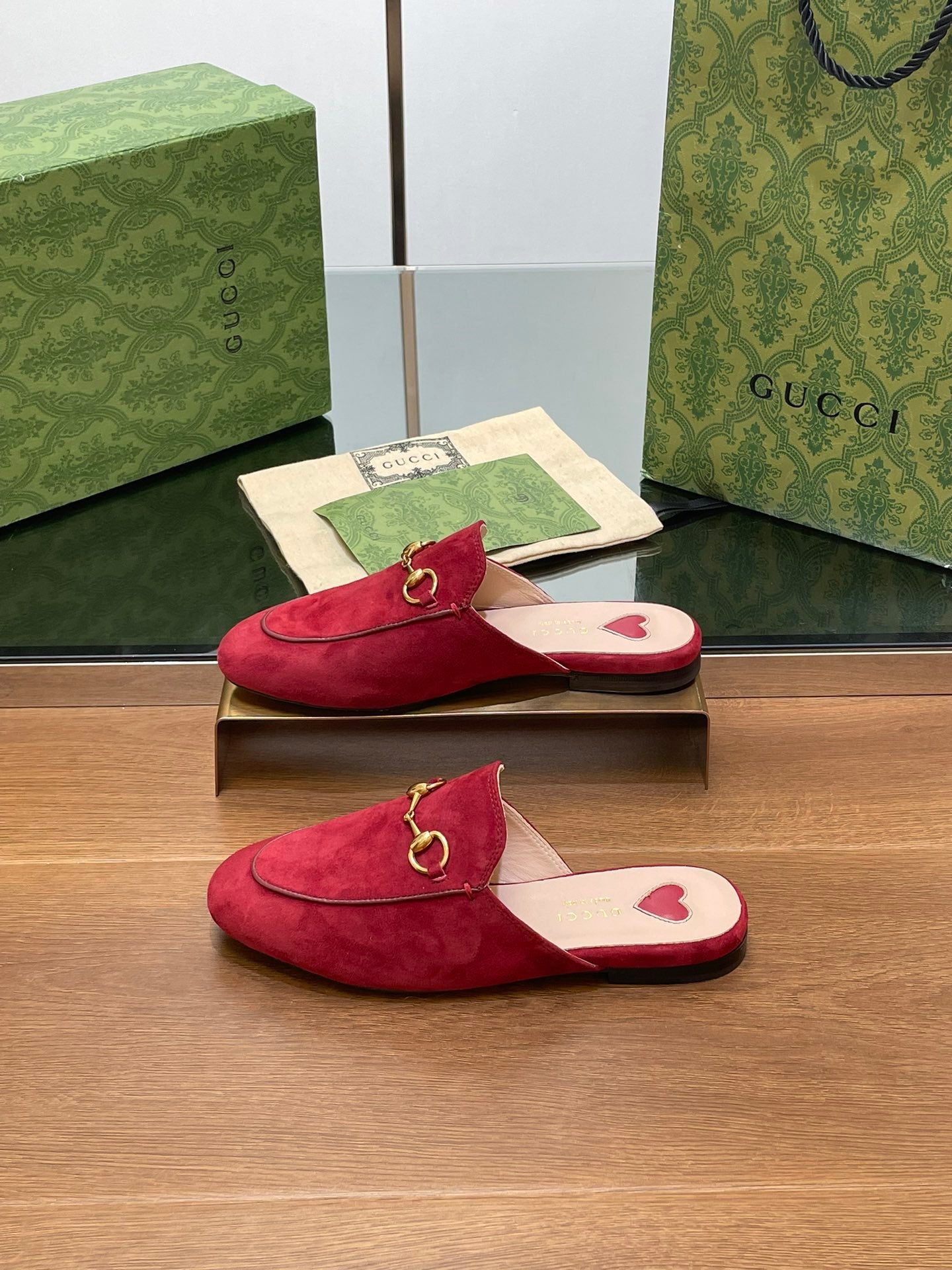 GUCCI HORSEBIT MULE IN CHERRY RED SUEDE WITH GOLD HARDWARE