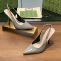 GUCCI HIGH SLINGBACK 10.5 CM IN DOVE GREY GLOSSY CALFSKIN WITH GOLD HARDWARE