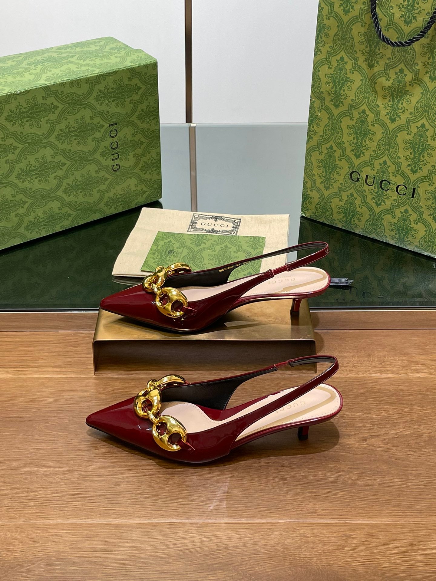 GUCCI MID-HEELED SLINGBACK 4.5 CM IN WINE RED GLOSSY CALFSKIN WITH GOLD HARDWARE