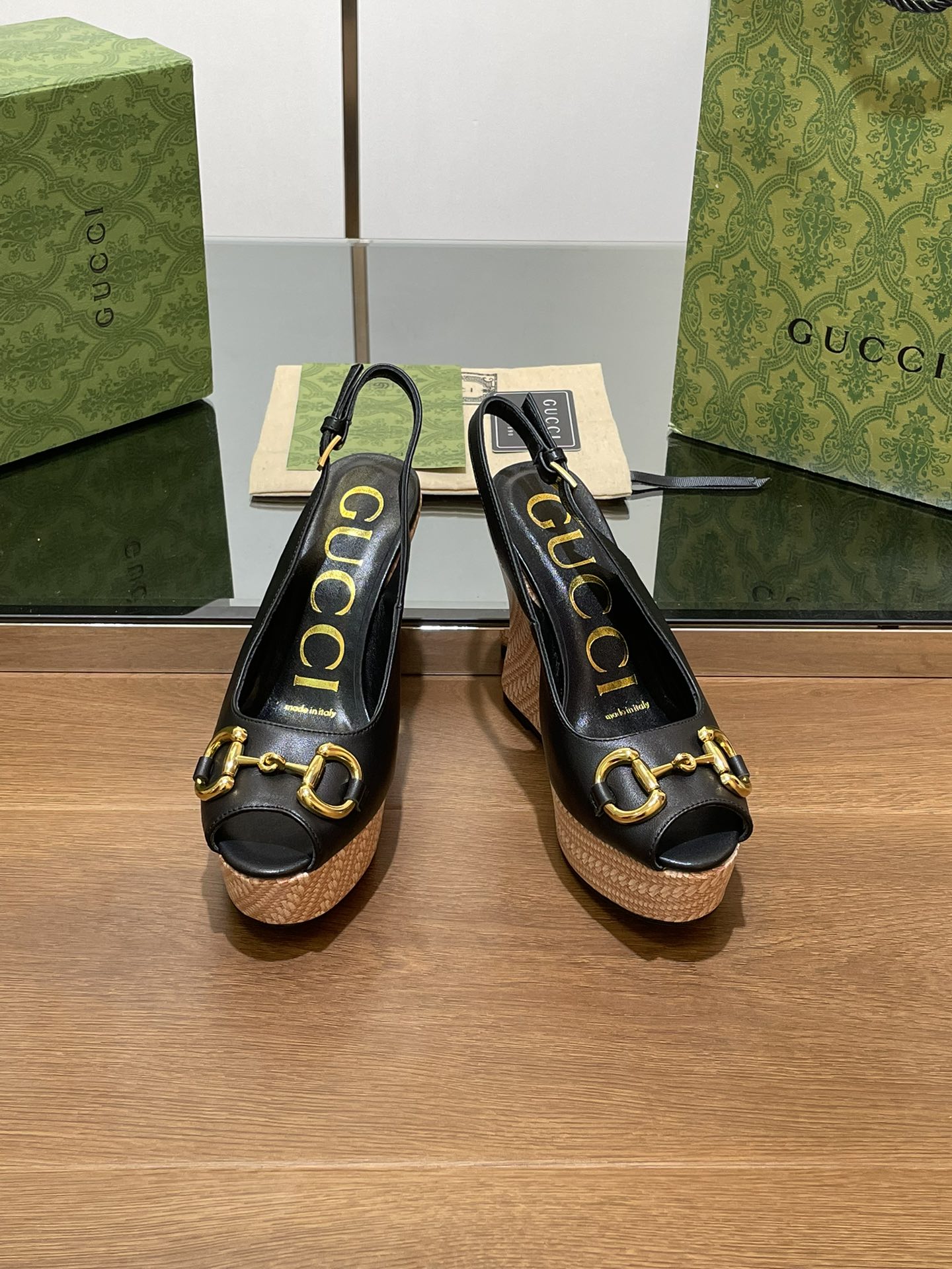 GUCCI WEDGE PLATFORM IN BLACK CALFSKIN WITH GOLD HARDWARE