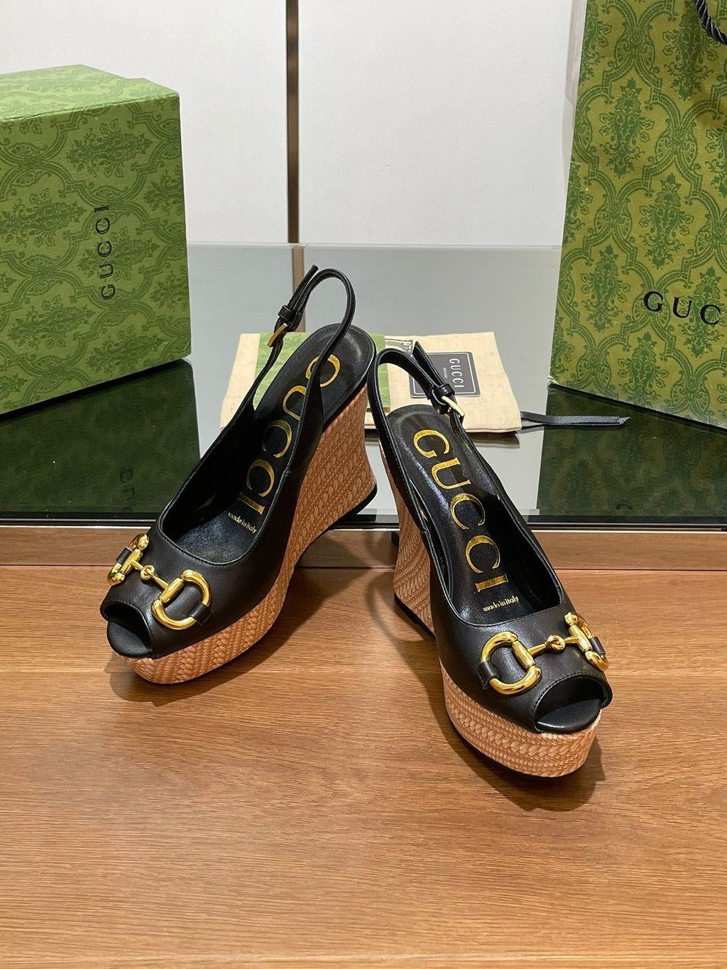 GUCCI WEDGE PLATFORM IN BLACK CALFSKIN WITH GOLD HARDWARE