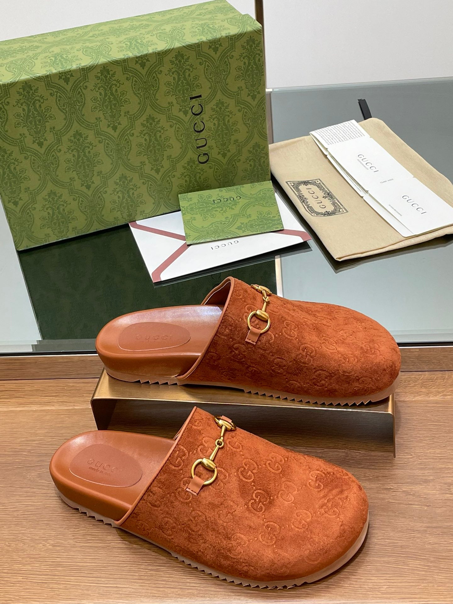 GUCCI HORSEBIT MULE IN BURNT ORANGE EMBOSSED SUEDE AND SHEEPSKIN LINING