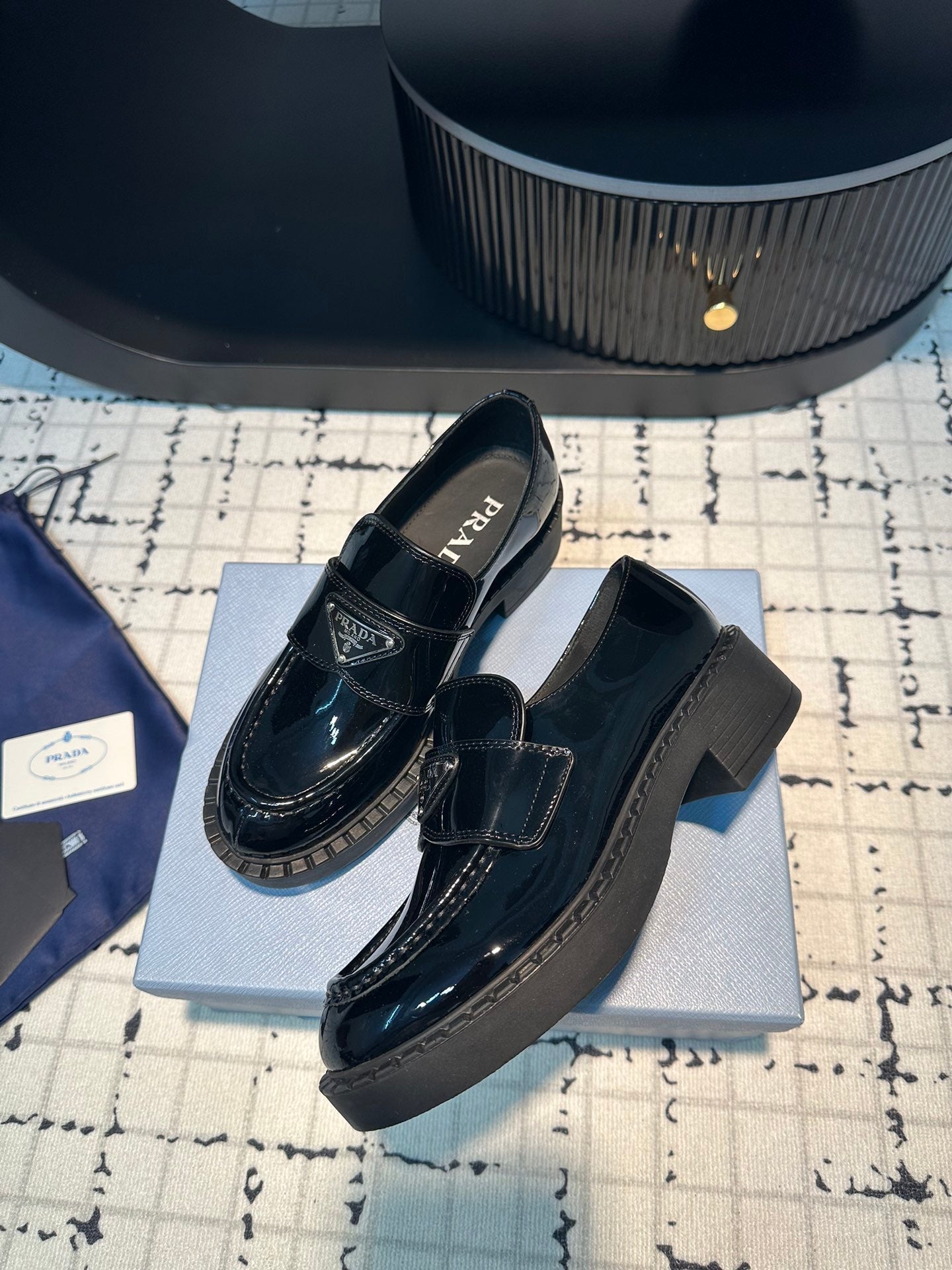 PRADA SCHOCOLATE BRUSHED LOAFERS GLOSSY BLACK CALFSKIN
