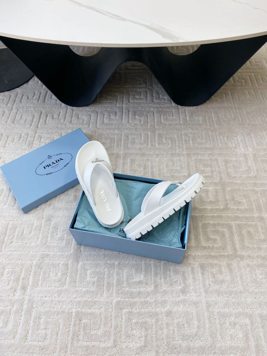 PRADA THICK-SOLED FLIP FLOPS IN WHITE RUBBER