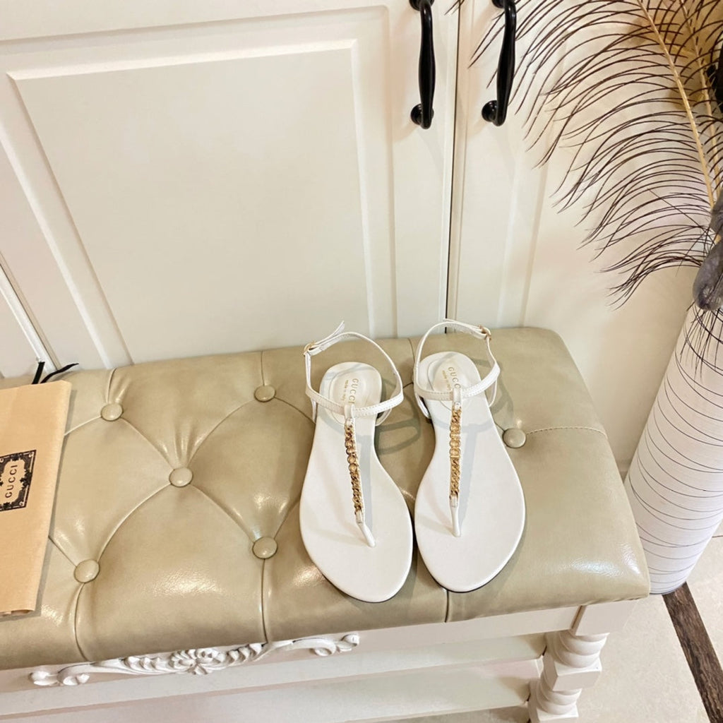 GUCCI SIGNORINA THONG SANDALS IN WHITE SHEEPSKIN