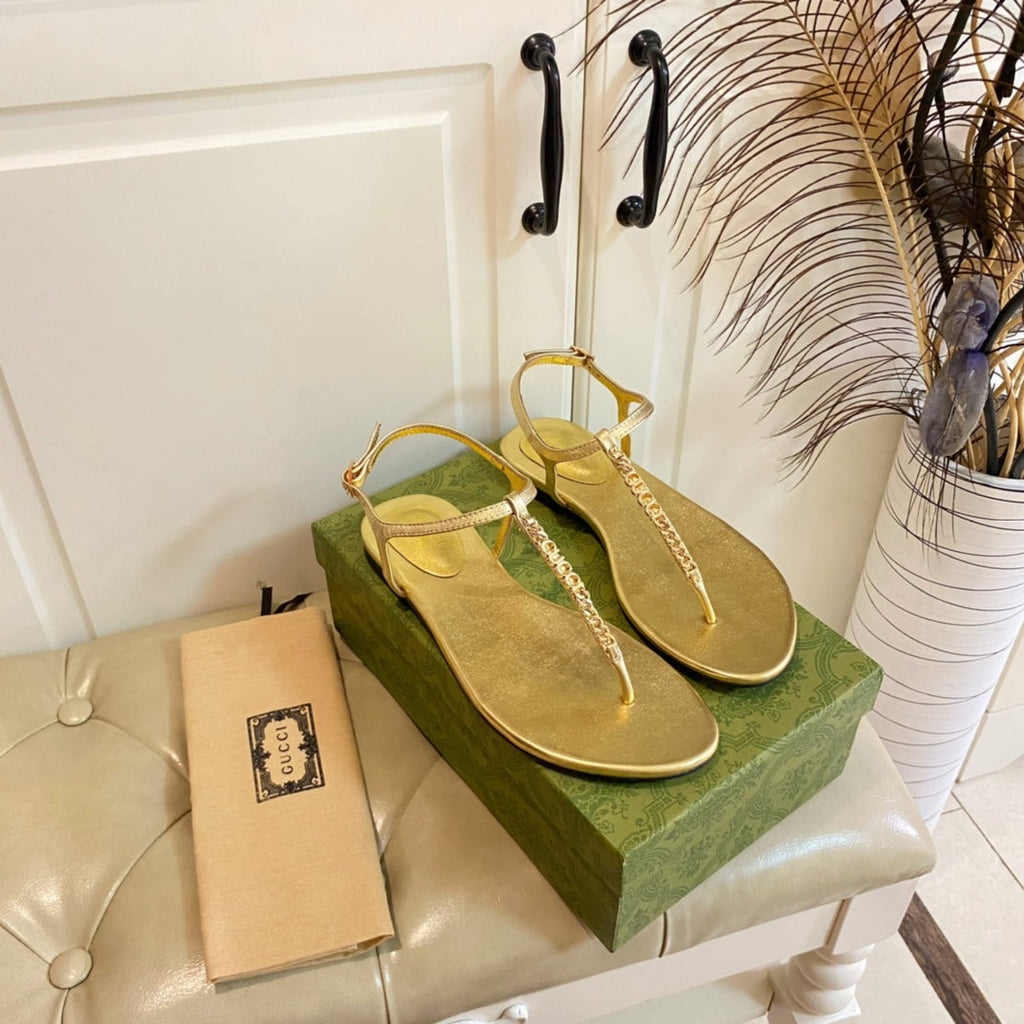GUCCI SIGNORINA THONG SANDALS IN GOLD SHEEPSKIN