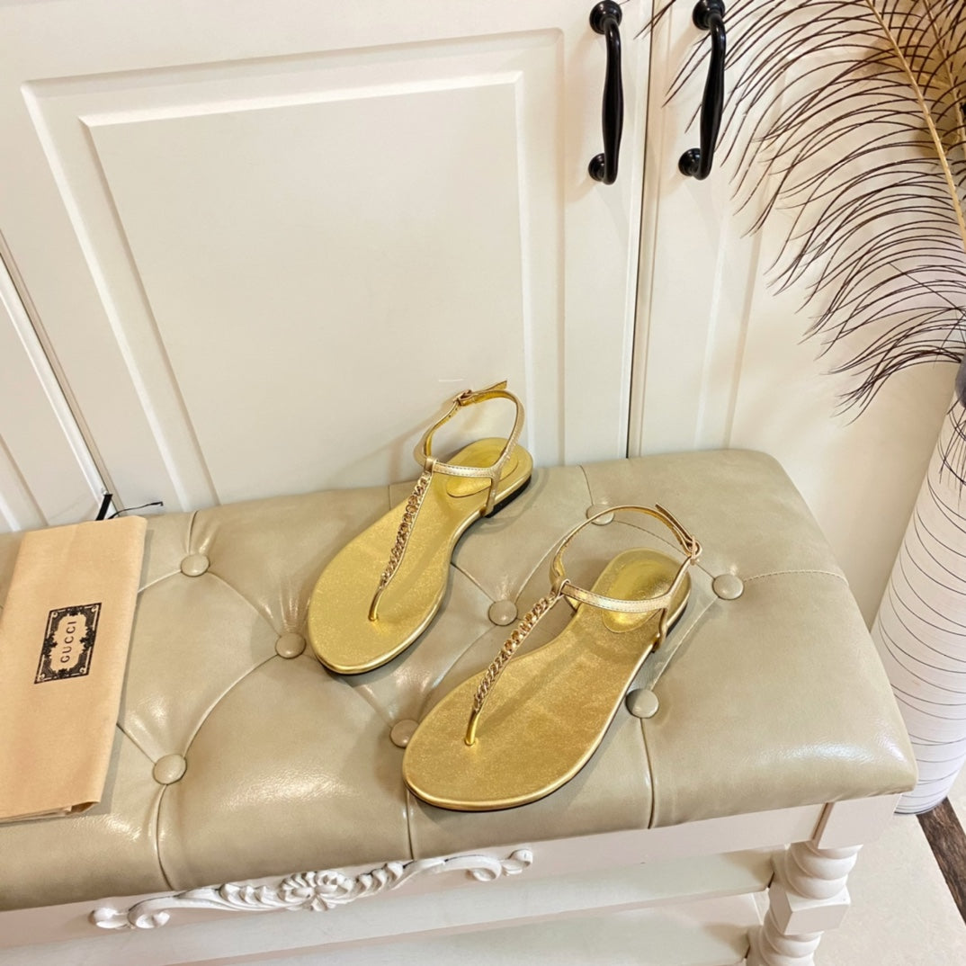 GUCCI SIGNORINA THONG SANDALS IN GOLD SHEEPSKIN