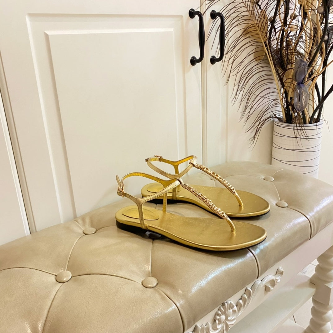 GUCCI SIGNORINA THONG SANDALS IN GOLD SHEEPSKIN