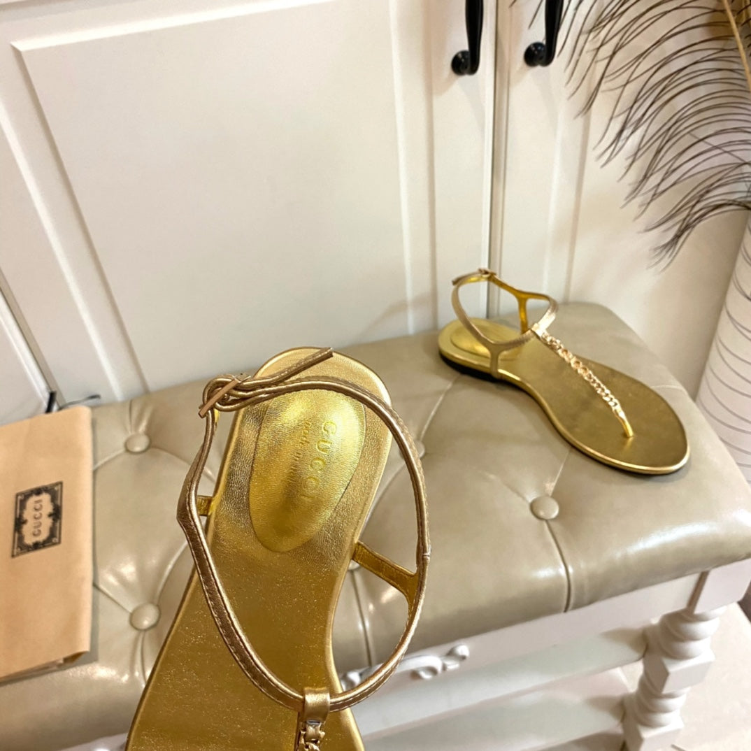 GUCCI SIGNORINA THONG SANDALS IN GOLD SHEEPSKIN