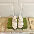 GUCCI SANDAL WITH ROUND INTERLOCKING G IN WHITE CALFSKIN
