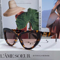 GLIMPSE CAT EYE SUNGLASSES 555885 IN HAVANA ACETATE