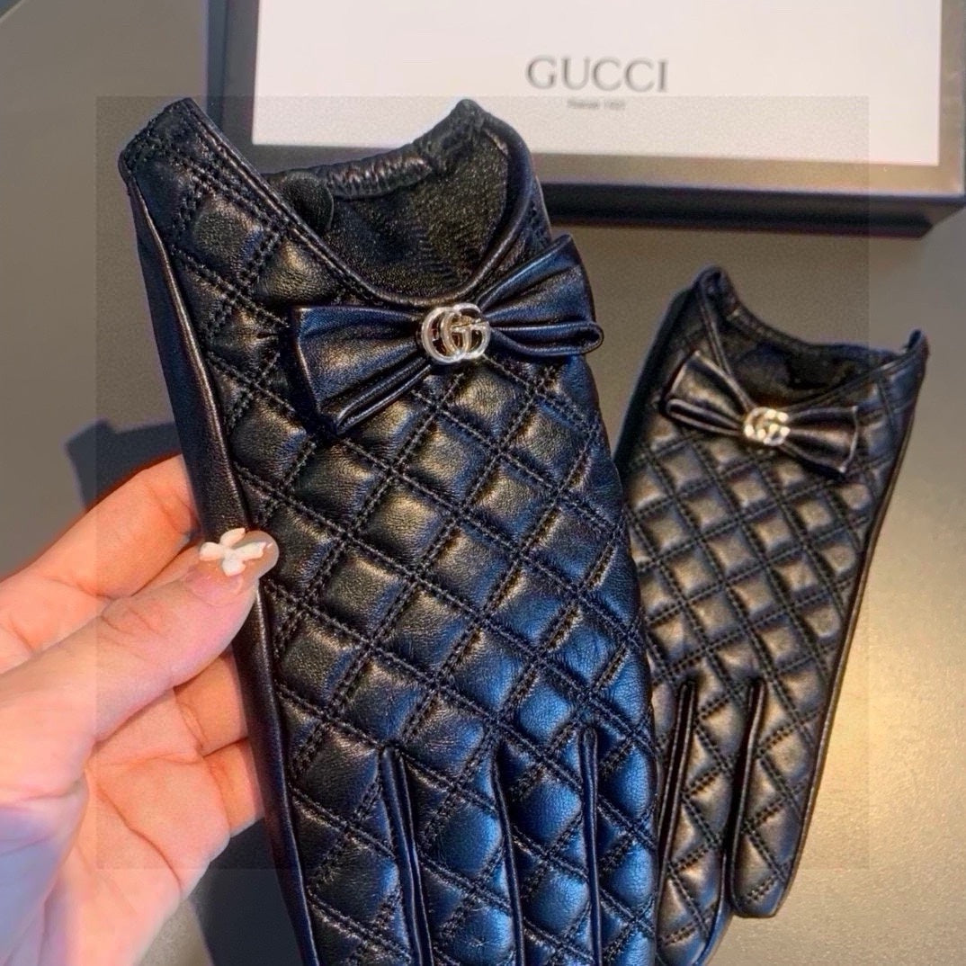 GUCCI TOUCHSCREEN GLOVES WITH BOW IN BLACK LAMBSKIN 467968
