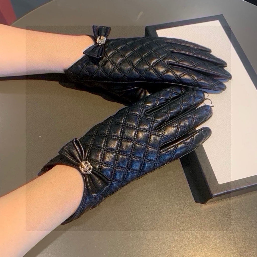 GUCCI TOUCHSCREEN GLOVES WITH BOW IN BLACK LAMBSKIN 467968