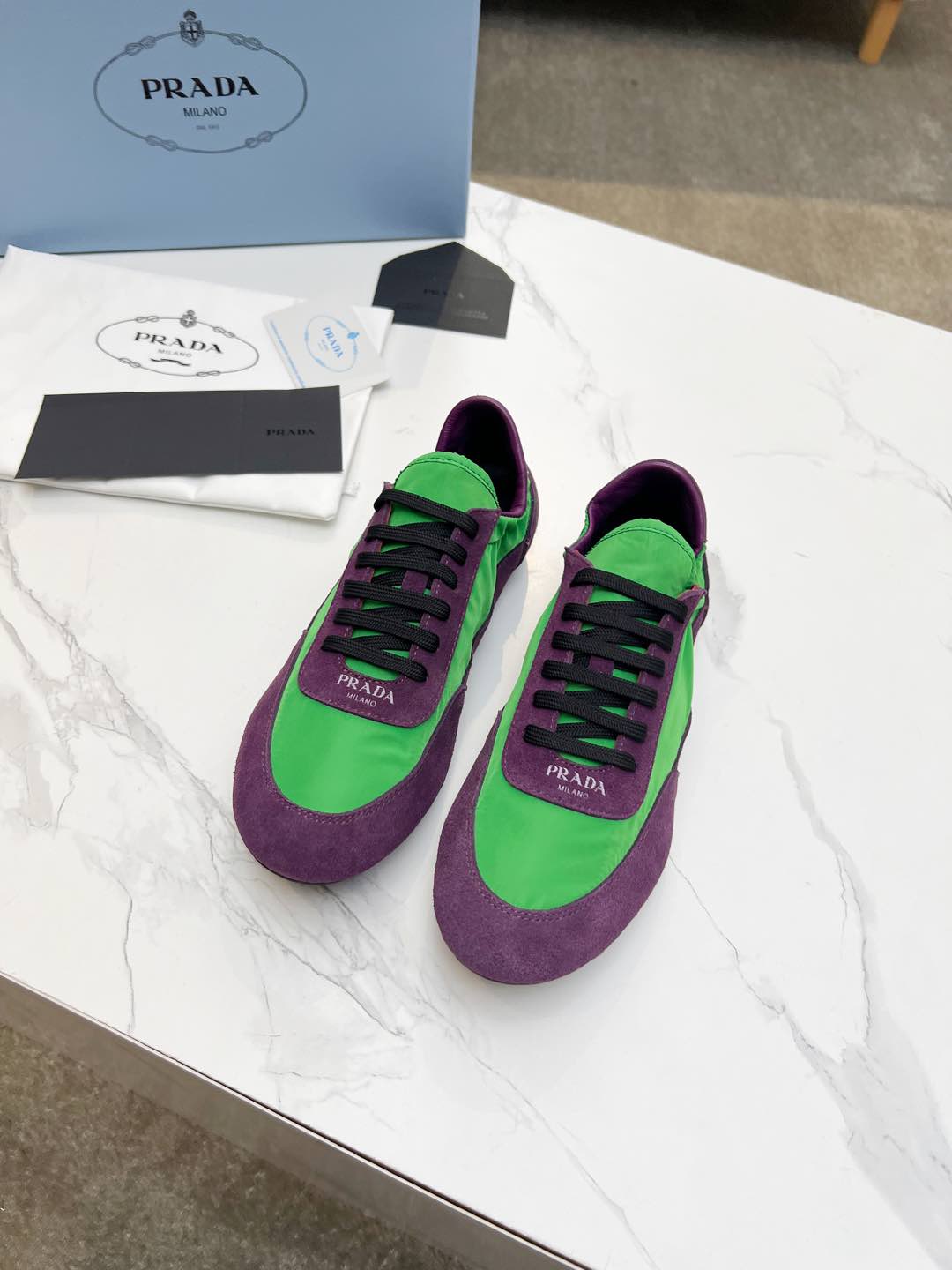 PRADA COLLAPSE SNEAKERS IN PURPLE SUEDE AND GREEN NYLON
