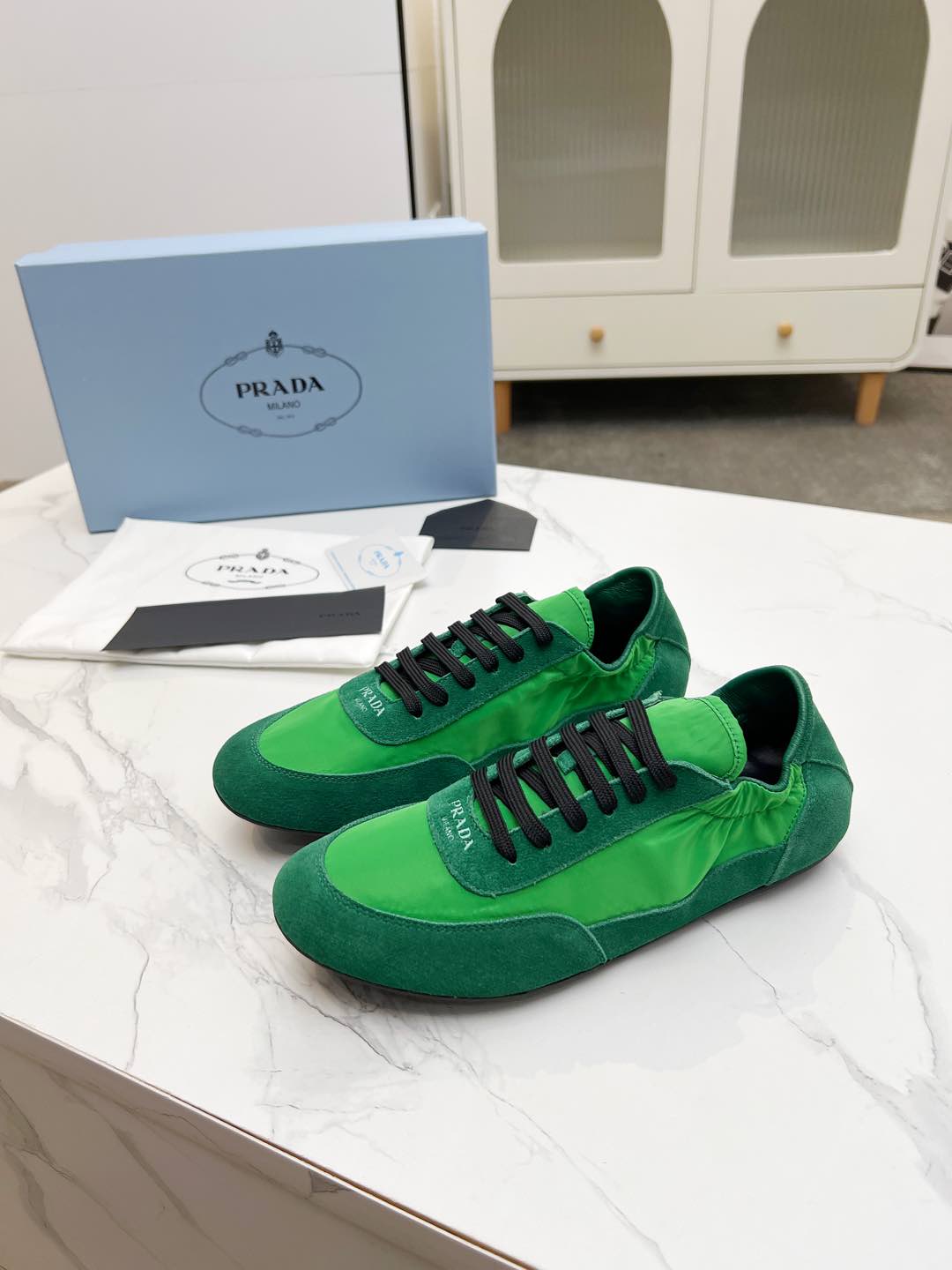 PRADA COLLAPSE SNEAKERS IN GREEN SUEDE AND NYLON